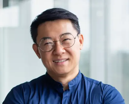 Portrait of Michael Chen, Community Outreach Coordinator